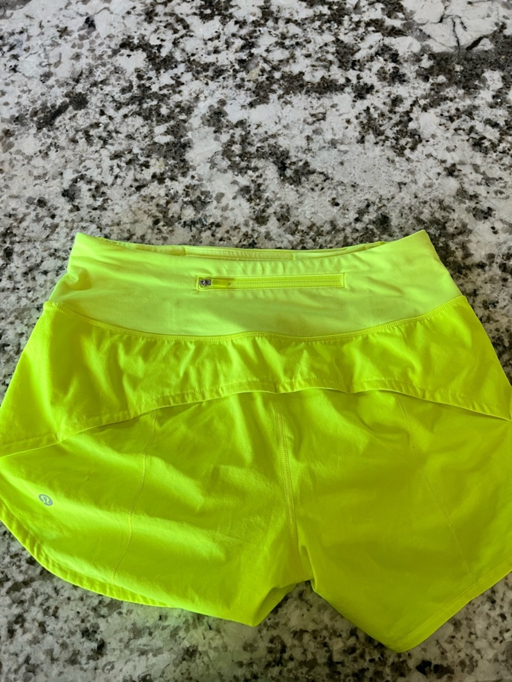 Lululemon Speed Up Mid-Rise Short
4". Size 4